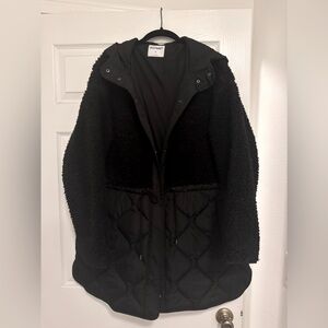 Sherpa and nylon jacket drawstring waist. Black